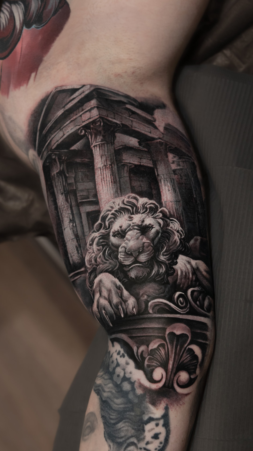 Detailed black-and-gray owl forearm tattoo by Tony Vilella