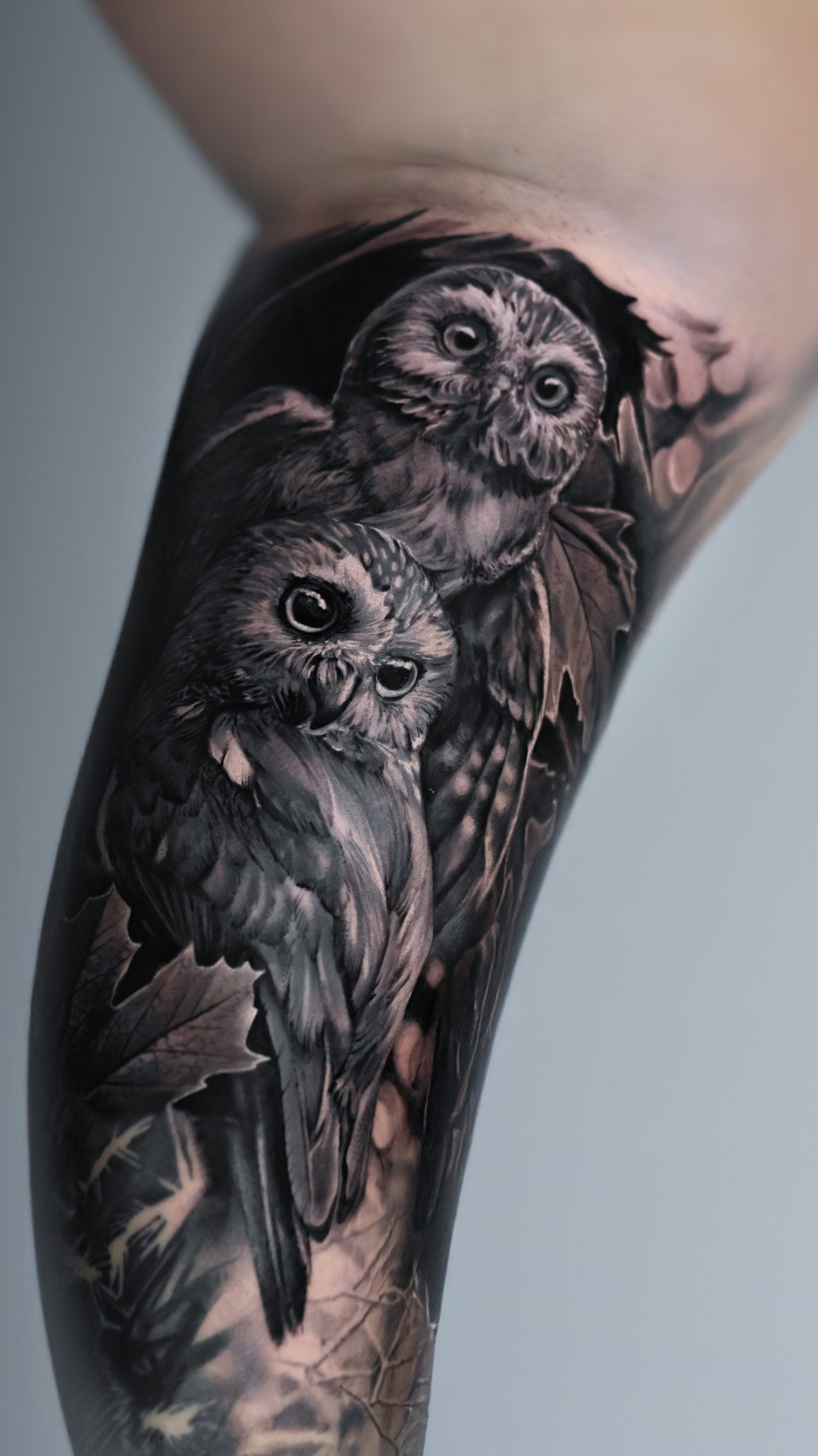Black-and-gray owl realism tattoo by Tony Vilella