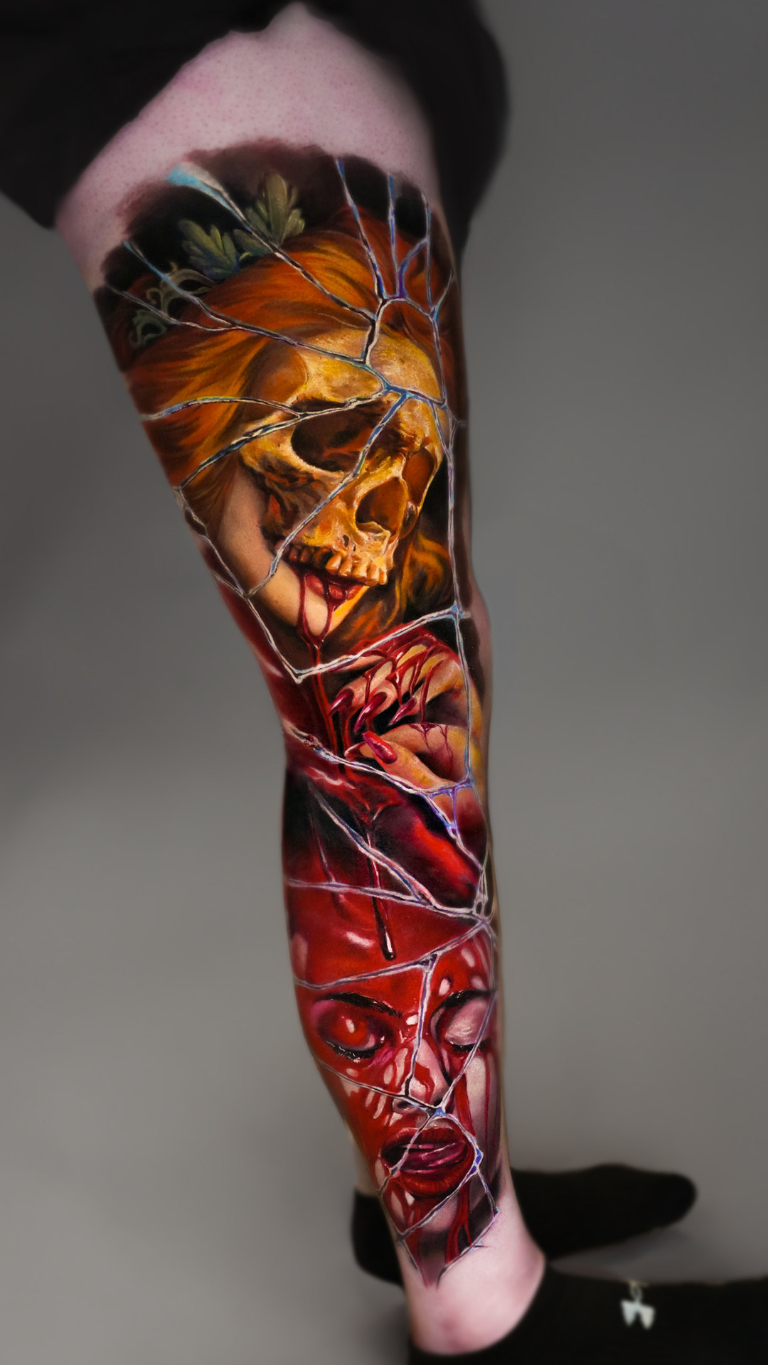 Abstract color realism calf tattoo by Tony Vilella