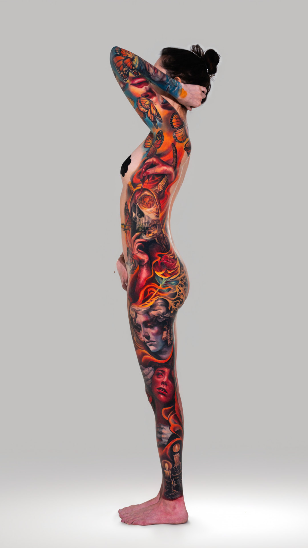 Large-scale color realism leg tattoo by Tony Vilella