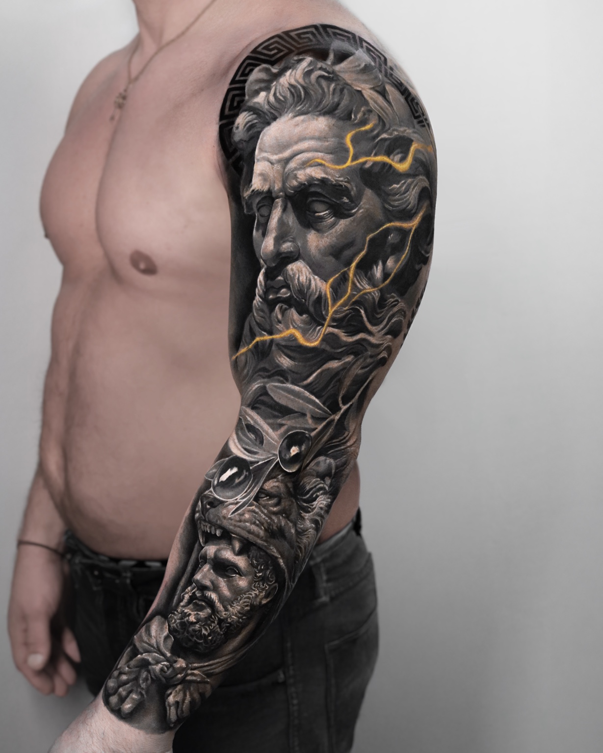 Black-and-gray Zeus and Hercules realism sleeve by Tony Vilella